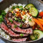 Korean barbecue, often referred to as "gogi-gui," has become a beloved culinary trend worldwide, celebrated not only for its mouthwatering flavors but also for its cultural significance. This communal style of dining typically involves grilling marinated meats at the table, creating an interactive and lively experience. The aroma of sizzling steak, the vibrant colors of fresh vegetables, and the rich array of dipping sauces all contribute to the unique charm of Korean BBQ. Among the many dishes inspired by this culinary tradition, the Korean BBQ Steak Rice Bowls with Spicy Cream Sauce stand out as a delightful fusion of flavors, convenience, and nutrition.